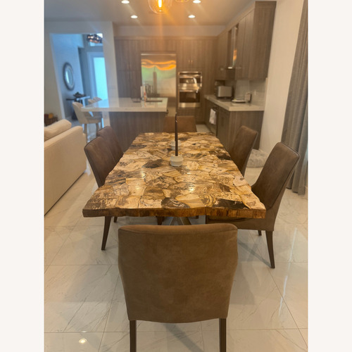 Used Arhaus Petra Dining Table Petrified Wood for sale on AptDeco