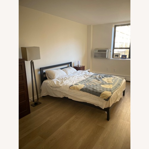 Used Amazon Zinus Queen Bed frame with Headboard for sale on AptDeco