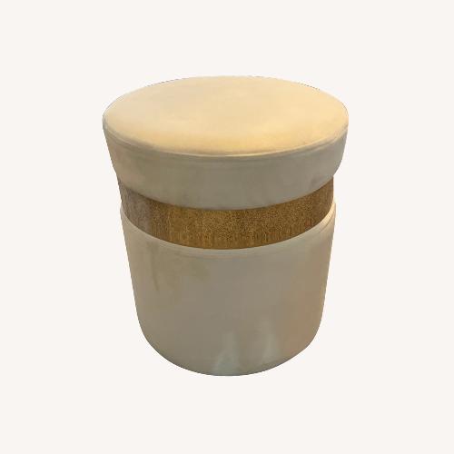 Used Cream Ottoman with Gold Band for sale on AptDeco