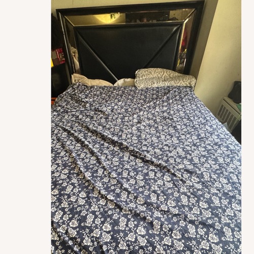 Used Black Wood Finish Queen Bed for sale on AptDeco