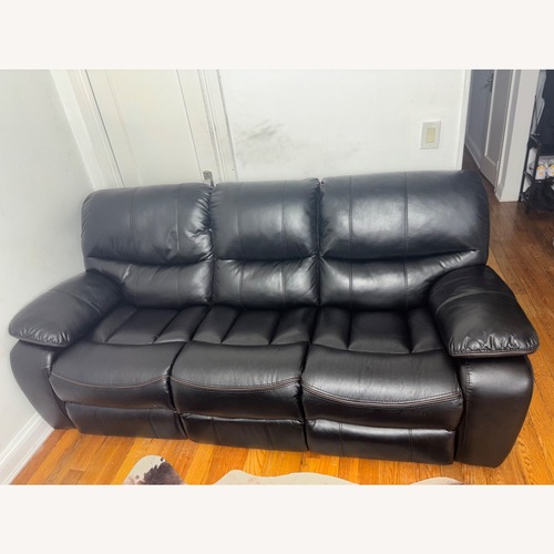 Used Black Faux Leather Power Recline Avengers Sofa for sale on AptDeco
