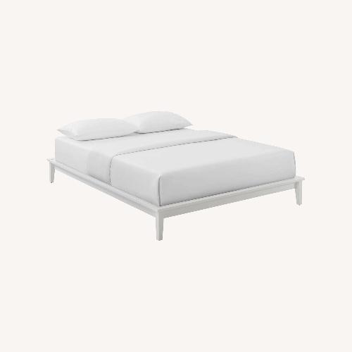 Used Queen Platform Bed In White Wood Slat Frame Finish for sale on AptDeco
