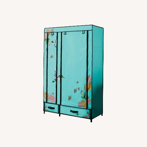 Used Blue humming bird armoire for sale on AptDeco