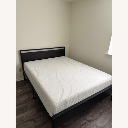Used SHA CERLIN Black Oak Bed Frame  for sale on AptDeco
