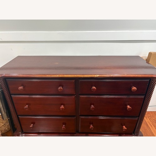 Used Munire Nursery Dresser Cherry Wood for sale on AptDeco