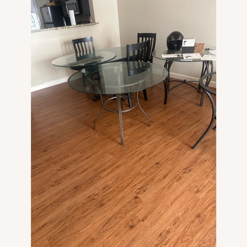 Used Paris Road Glass Table for sale on AptDeco