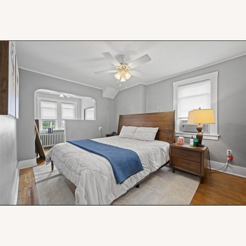 Used Malibu Dark Brown King Bed for sale on AptDeco