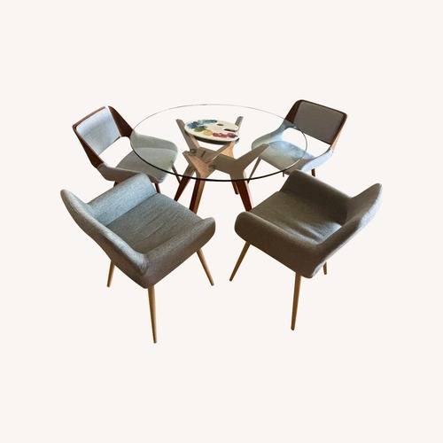 Used Glass & Wood Round Dining Table with 4 Chairs for sale on AptDeco