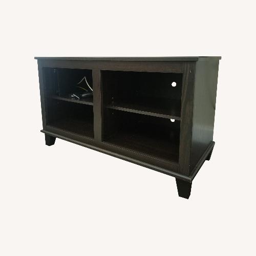 Used Cort Eclipse Dark Wood TV Stand for sale on AptDeco