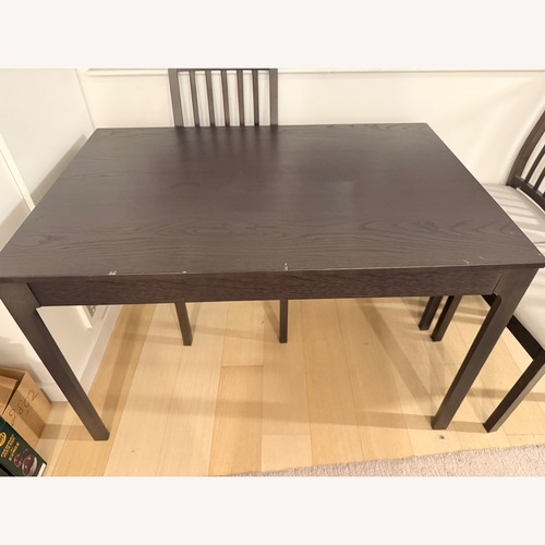 Used IKEA Brown Extendable Dining Table Set for sale on AptDeco