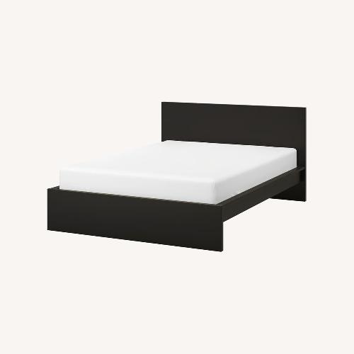 Used IKEA Dark Brown King Bed With Storage for sale on AptDeco