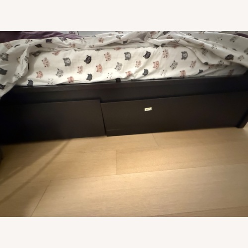 Used IKEA Dark Brown King Bed With Storage for sale on AptDeco