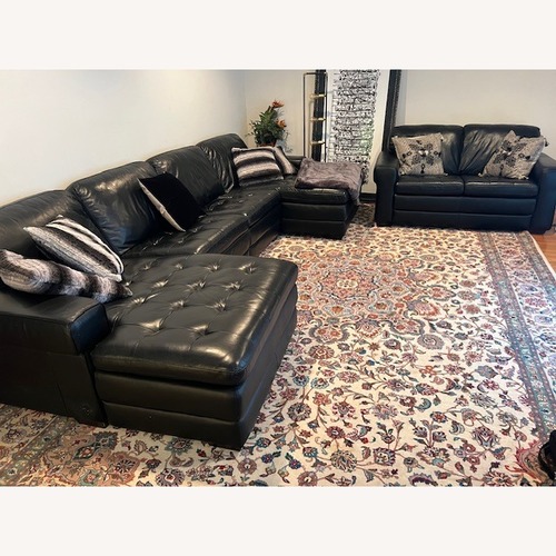Used Black Sectional  for sale on AptDeco
