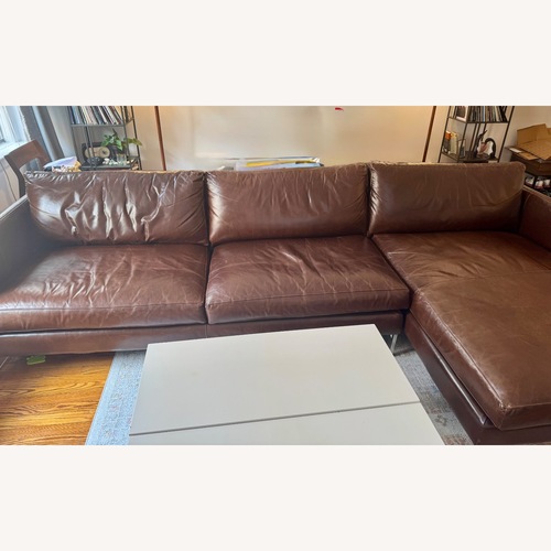 Used ABC Leather Chaise Sectional for sale on AptDeco