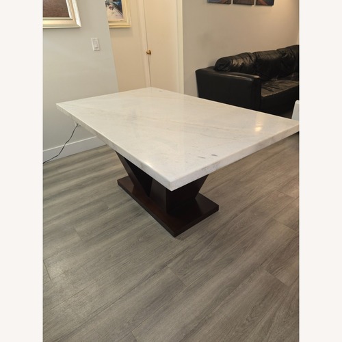 Used White Marble with Walnut Base Dining Table for sale on AptDeco