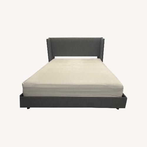 Used King Bed with Studded Headboard for sale on AptDeco
