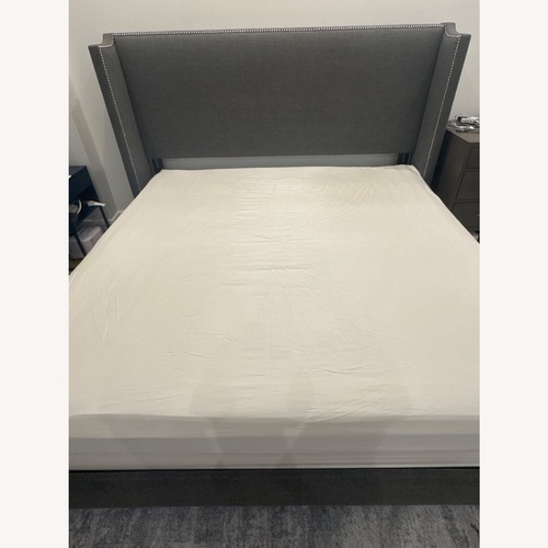 Used King Bed with Studded Headboard for sale on AptDeco