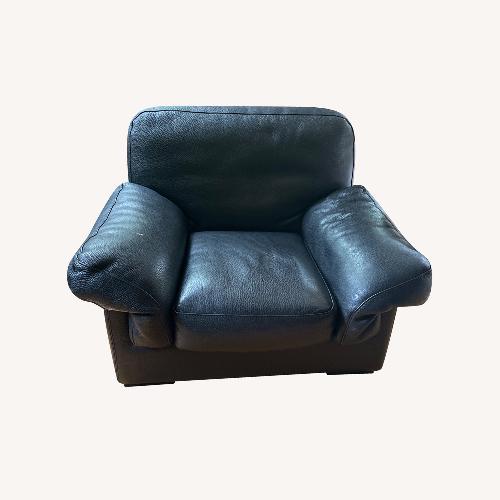 Used Roche Bobois Black Grain Letter Armchair for sale on AptDeco