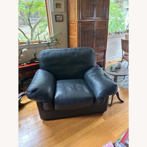 Used Roche Bobois Black Grain Letter Armchair for sale on AptDeco