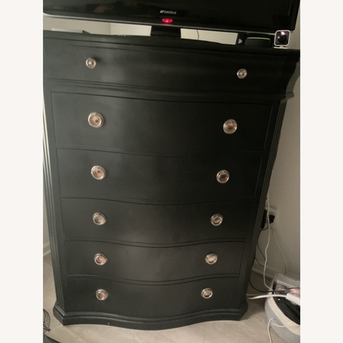 Used Raymour and Flanigan Black Dresser for sale on AptDeco