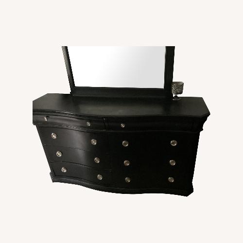 Used Raymour and Flanigan Black Dresser  for sale on AptDeco