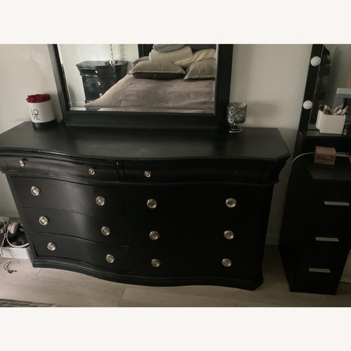Used Raymour and Flanigan Black Dresser  for sale on AptDeco