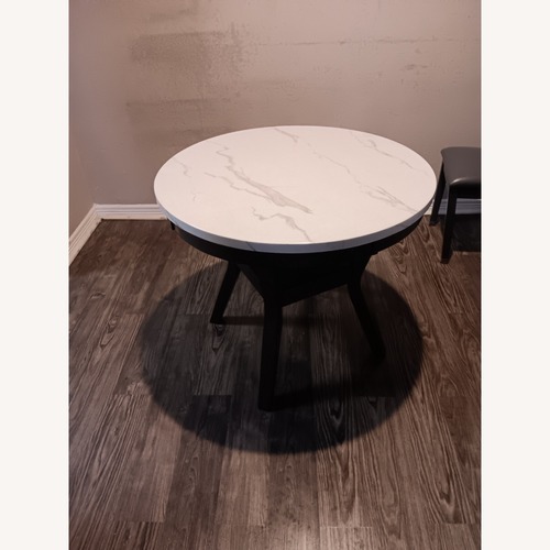 Used Round Dining Table for sale on AptDeco