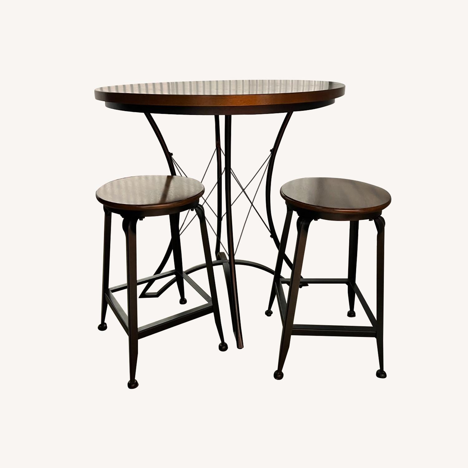 Steve Silver Co. Wooden Kitchen Table and Two Stools - image-0