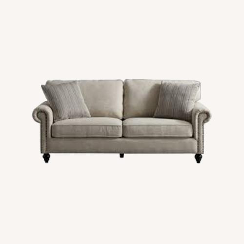 Used Ashley Fabric Sofa with Brass Nailhead Trim for sale on AptDeco
