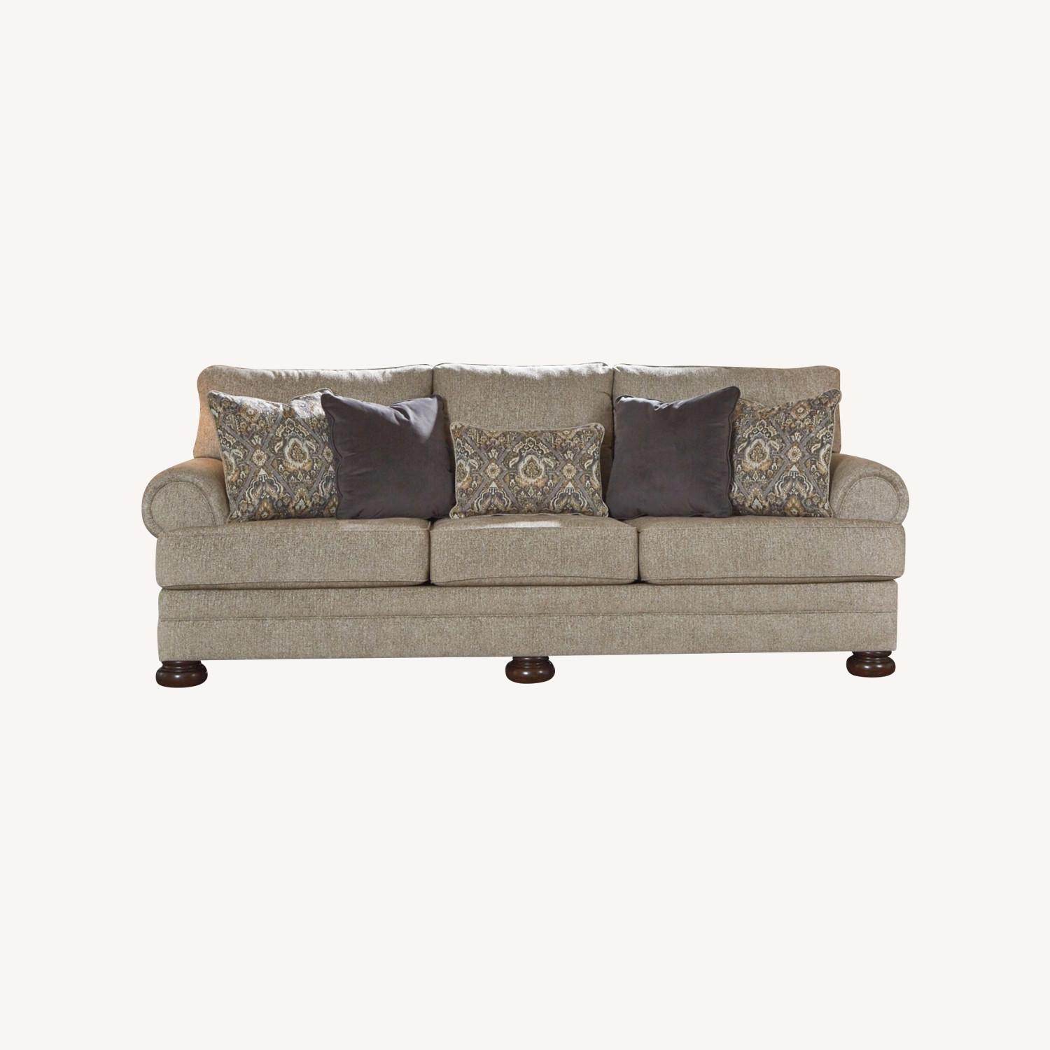 Ashley Furniture Beige Kananwood Sofa - image-0