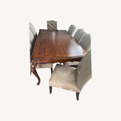 Used Wood Dining Set with 8 Custom Upholstered Chairs for sale on AptDeco