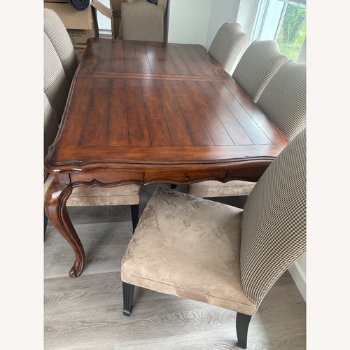 Used Wood Dining Set with 8 Custom Upholstered Chairs for sale on AptDeco
