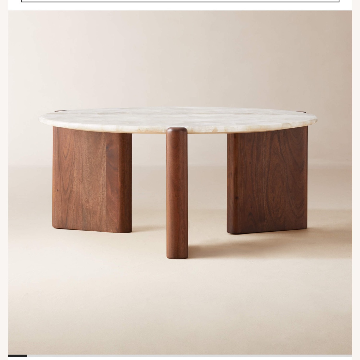 CB2 Santoro 37" Round White Quartz Coffee Table - image-1