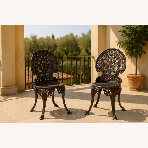 Used Two Antique Baroque Cast Iron Garden Chairs for sale on AptDeco
