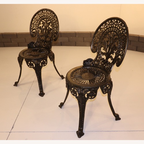 Used Two Antique Baroque Cast Iron Garden Chairs for sale on AptDeco