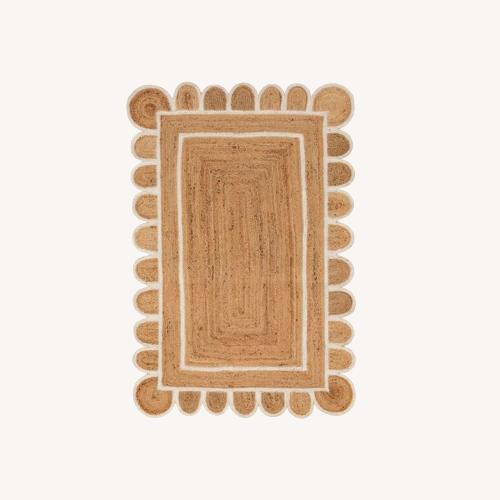 Used White Trim Jute Scallop Braided Handmade Rug for sale on AptDeco