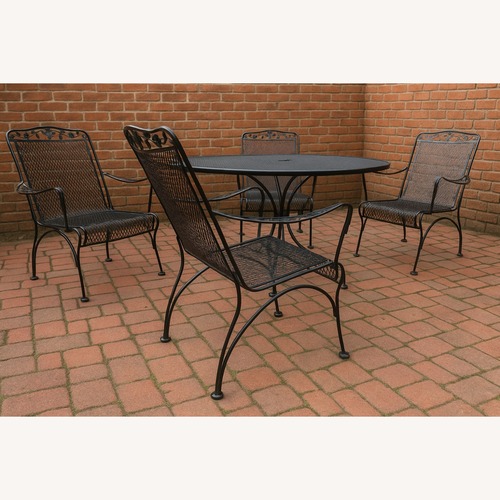 Used Vintage Flower and Leaf Wrought Iron Dining Set for sale on AptDeco