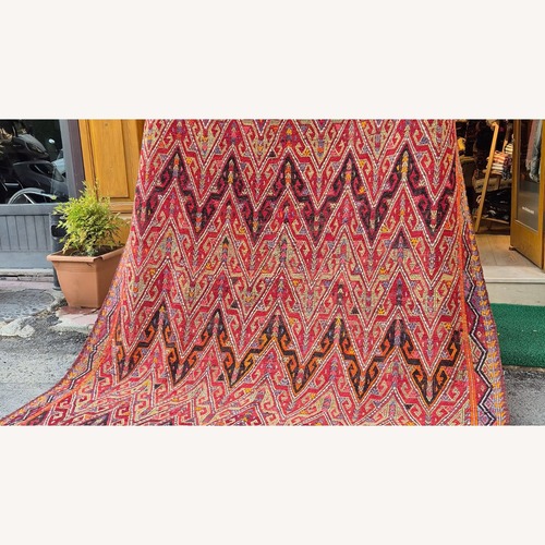 Used Midcentury Handwoven Rug In Pomegranate Skin for sale on AptDeco