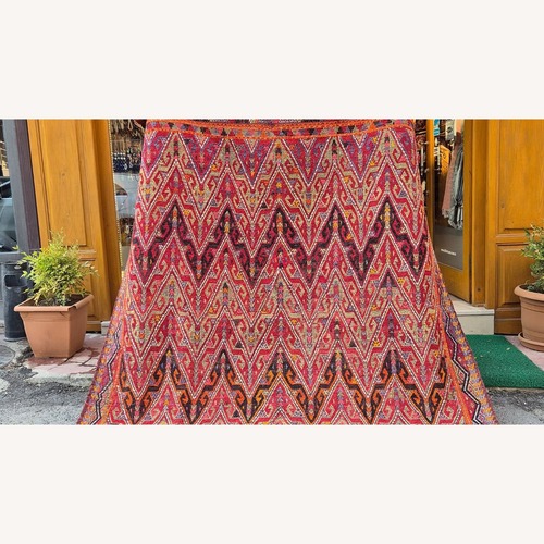 Used Midcentury Handwoven Rug In Pomegranate Skin for sale on AptDeco
