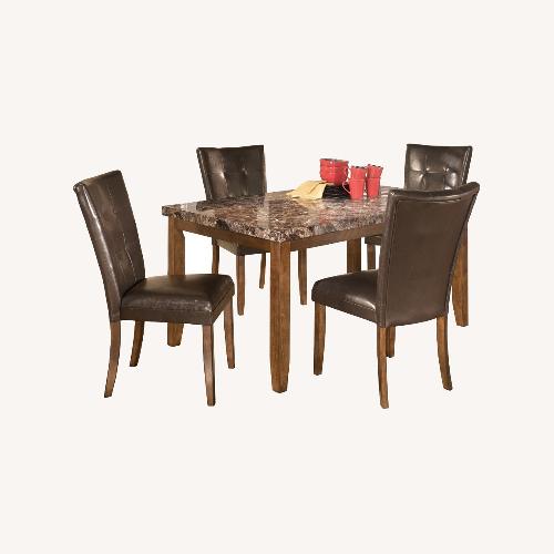 Used Ashley Furniture Lacy Brown Dining Set for sale on AptDeco