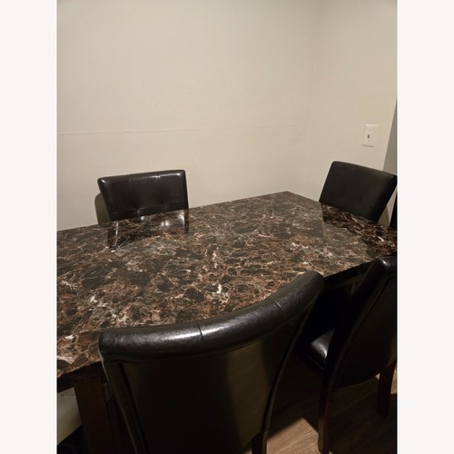Used Ashley Furniture Lacy Brown Dining Set for sale on AptDeco