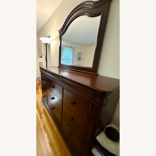 Used 12 Drawer Dresser with Mirror for sale on AptDeco