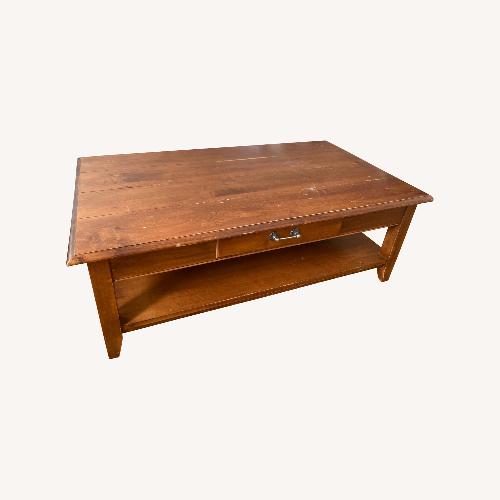 Used Ethan Allen Solid Wood Coffee Table for sale on AptDeco