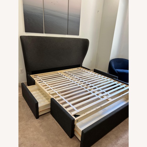 Used Crate & Barrel Carlie Wingback Bed with an Upholstered Storage Base for sale on AptDeco
