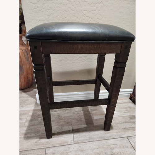 Used Mahogany Stools W Polyurethane Cushion for sale on AptDeco