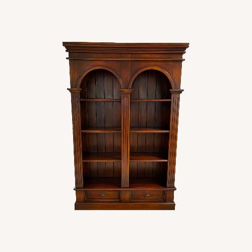 Used Double Arch Honey Mahogany Bookcase  for sale on AptDeco