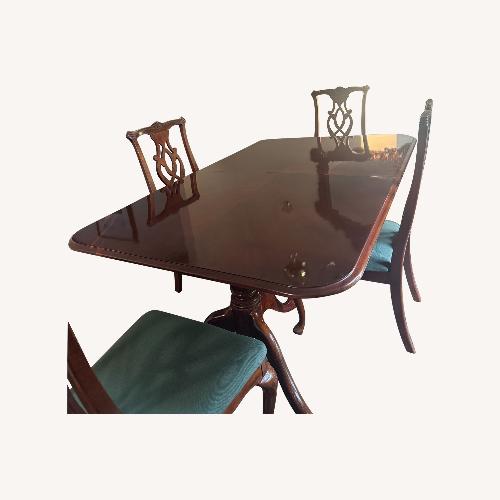 Used Cherry Wood Extendable Dining Table with 6 Chairs for sale on AptDeco
