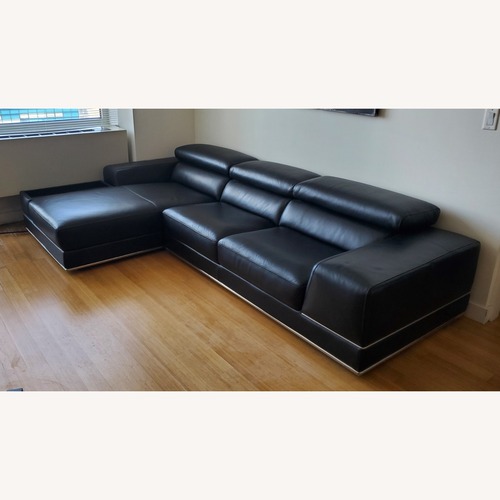 Used Modani Bergamo Black Leather Sectional for sale on AptDeco