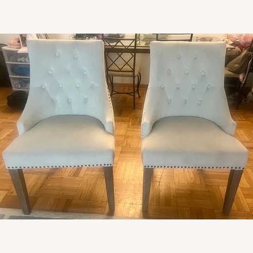 Used Light Blue Side Chairs with Nailhead Trim for sale on AptDeco