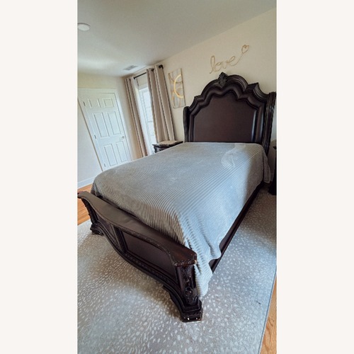 Used  Sheffield Upholstered King Bed in Dark Cherry for sale on AptDeco